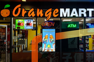 AdaptMedia Advertising in front of Orange Mart