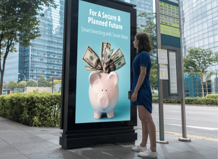 Woman looking at an urban panel DOOH ad