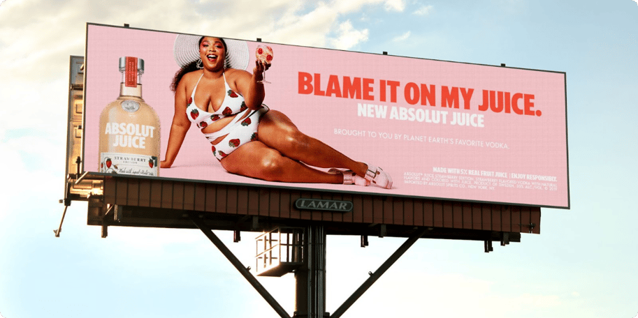 Lizzo DOOH advertisement on a large format screen