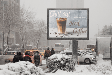 Billboard ad in a snowy city