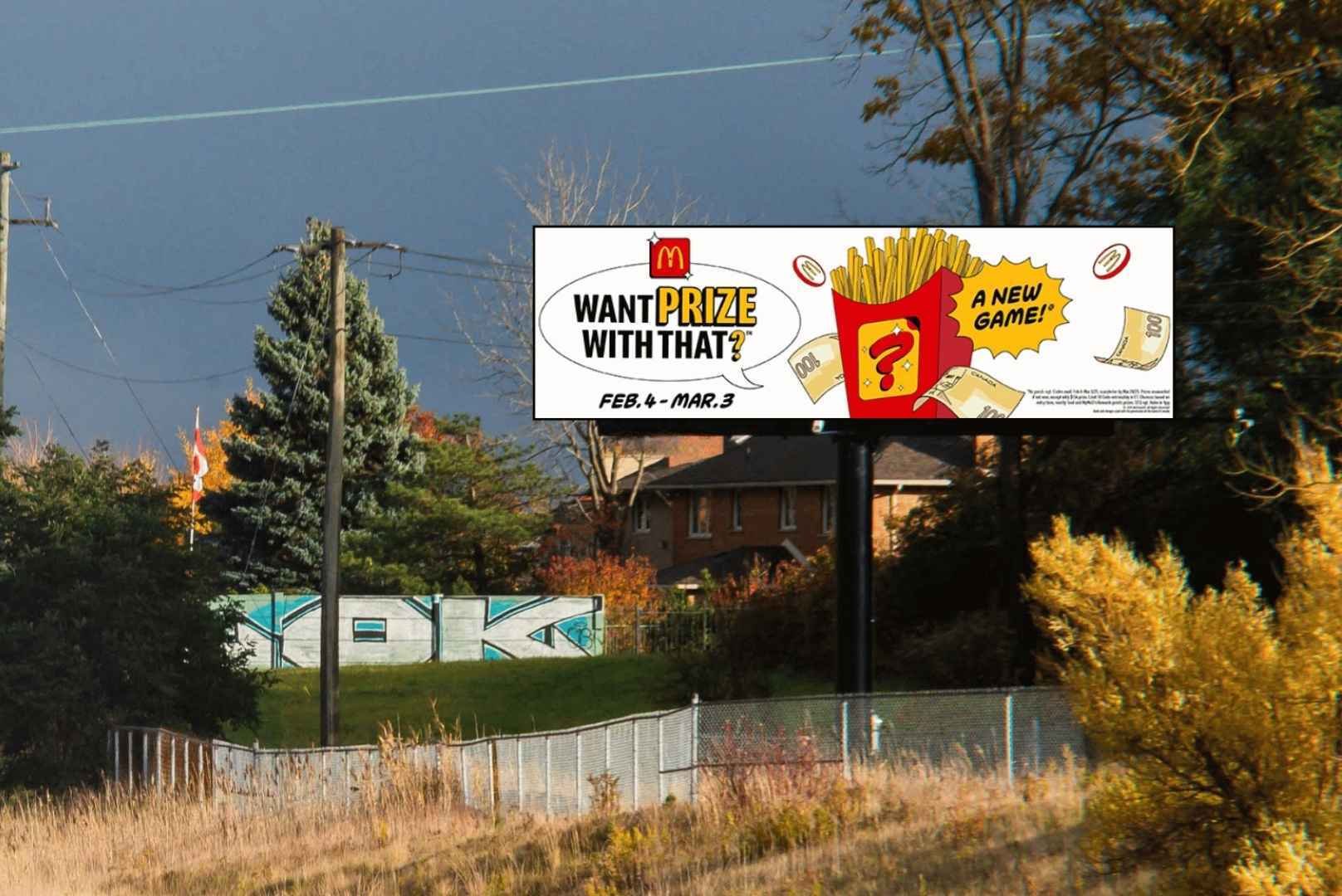 McDonald's "Want PRIZE with that" OOH campaign on a highway billboard