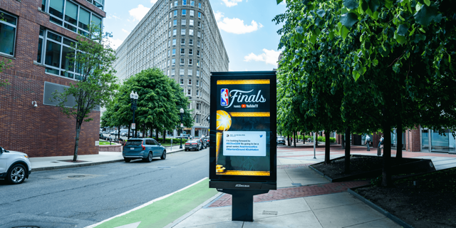 DOOH street-level screen with NBA advertisement